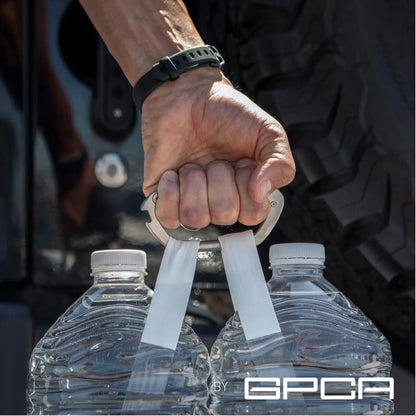 GPCA Carabiner LITE EDC keychain, silver metal carabiner securing two water bottles with white straps held in hand on Tampa Home & Garden Store