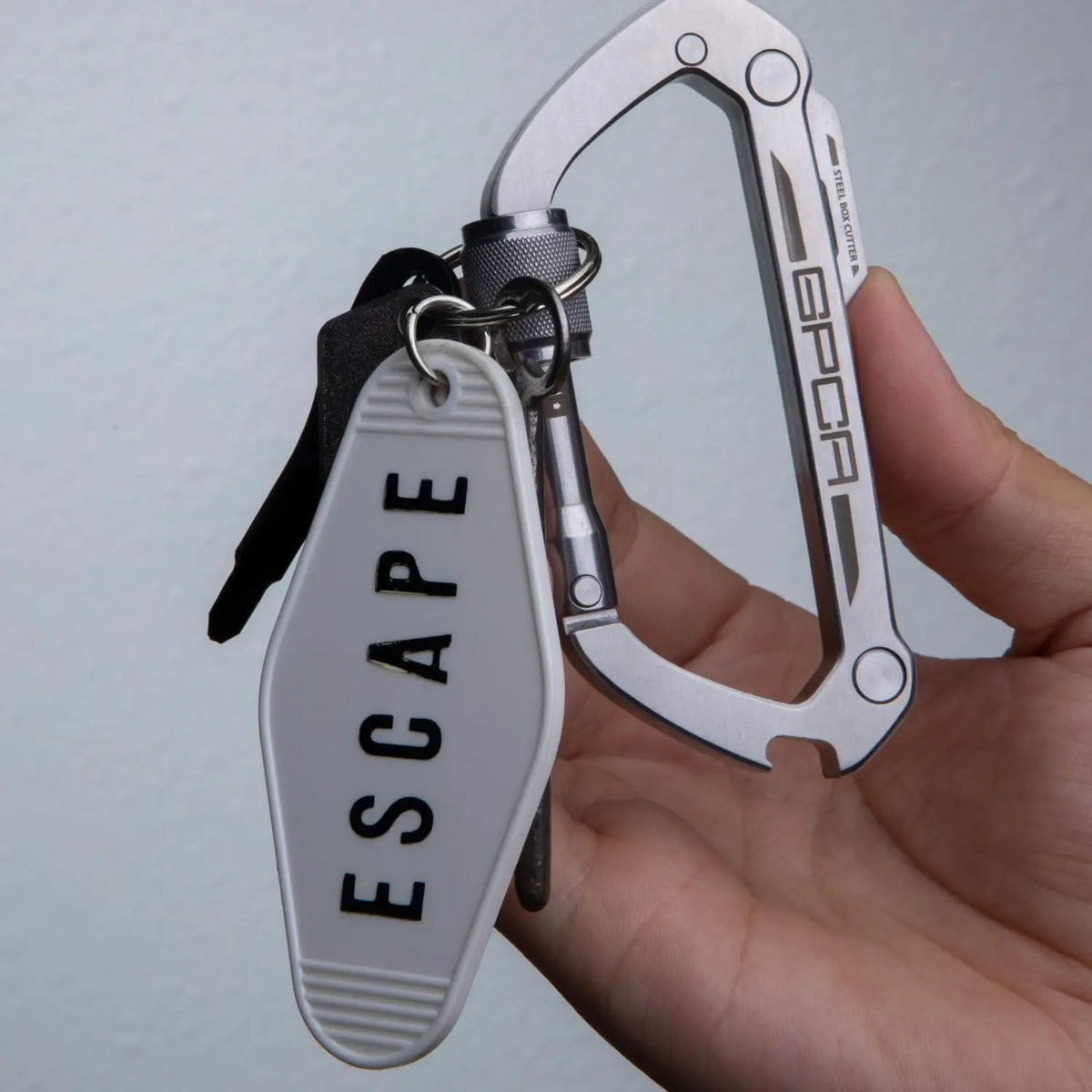 GPCA Carabiner LITE EDC keychain with silver aluminum carabiner and white tag on Tampa Home & Garden Store