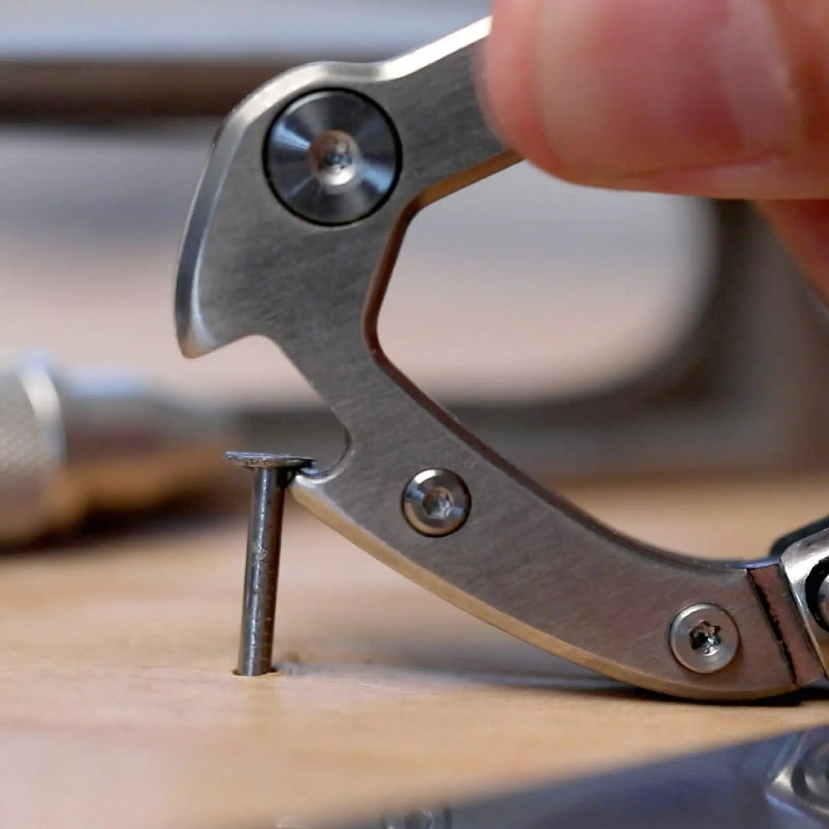 GPCA Carabiner PRO EDC multi-tool clip in brushed metal with visible screws on Tampa Home & Garden Store