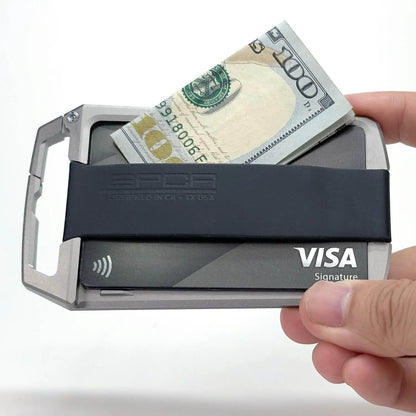 GPCA United-1 Wallet card holder with aluminum frame, holding cash and a Visa card on Tampa Home & Garden Store