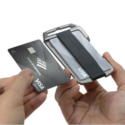 GPCA United-1 Wallet Card Holder in silver metal with black elastic strap, holding a Visa card on Tampa Home & Garden Store