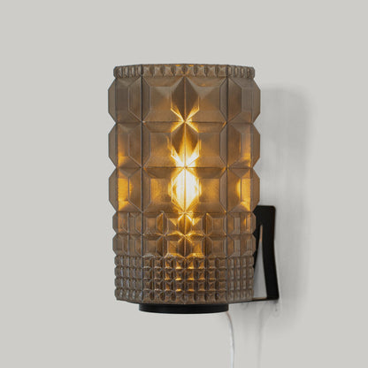 Gem Sconce wall light by Wooj Design with bronze faceted glass tiles, warm amber glow on Tampa Home & Garden Store
