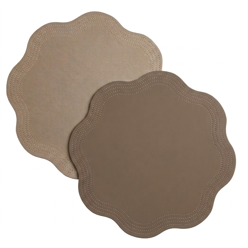 Double Sided Faux Leather Placemats: two scalloped taupe/beige placemats with white borders on Tampa Home & Garden Store