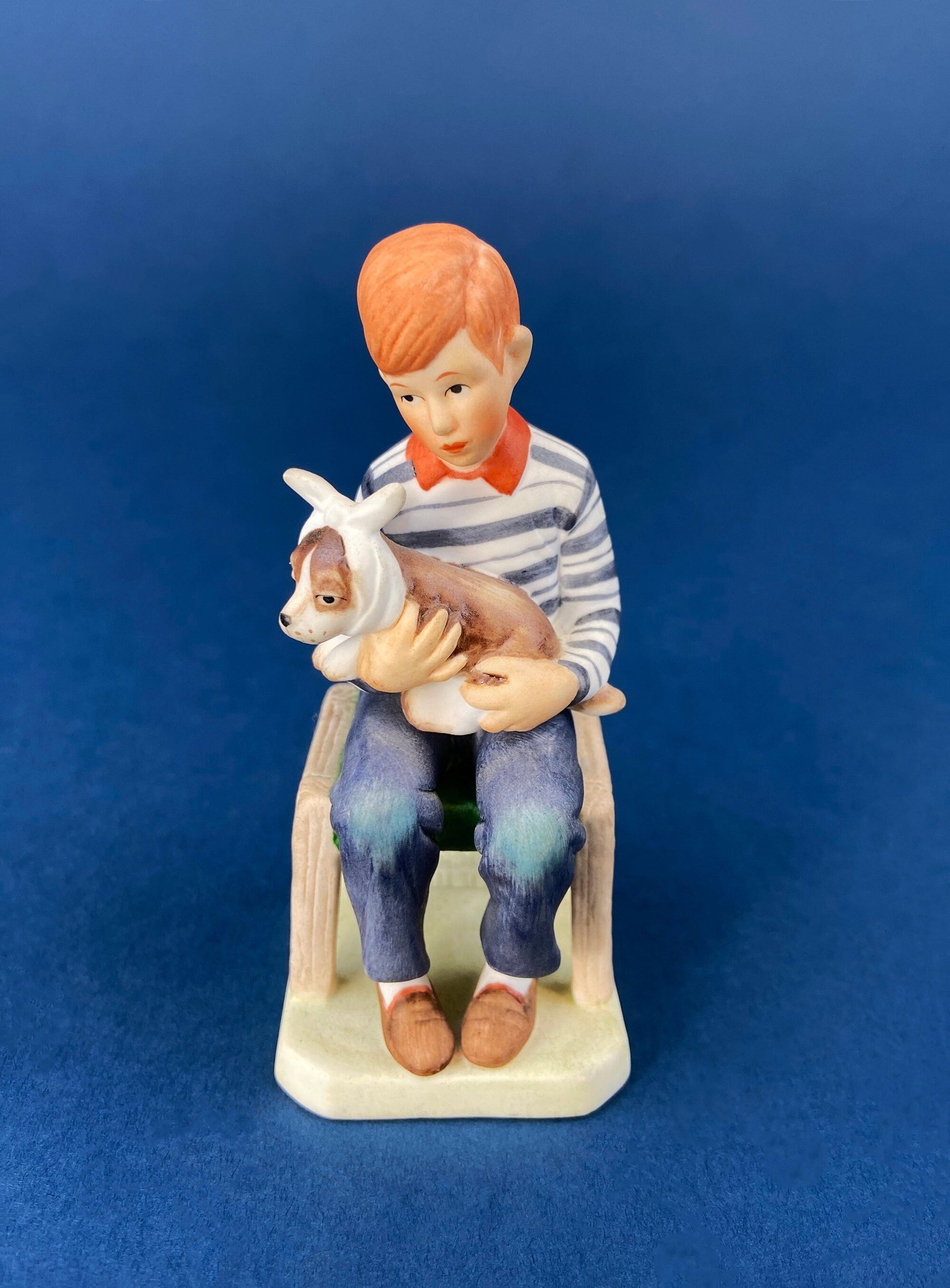 Get Well Soon Porcelain Figurine of Boy Holding Sick Dog. Inspired by Norman Rockwell's Saturday Evening Post Cover: "At the Vets." - Tampa Home & Garden Store
