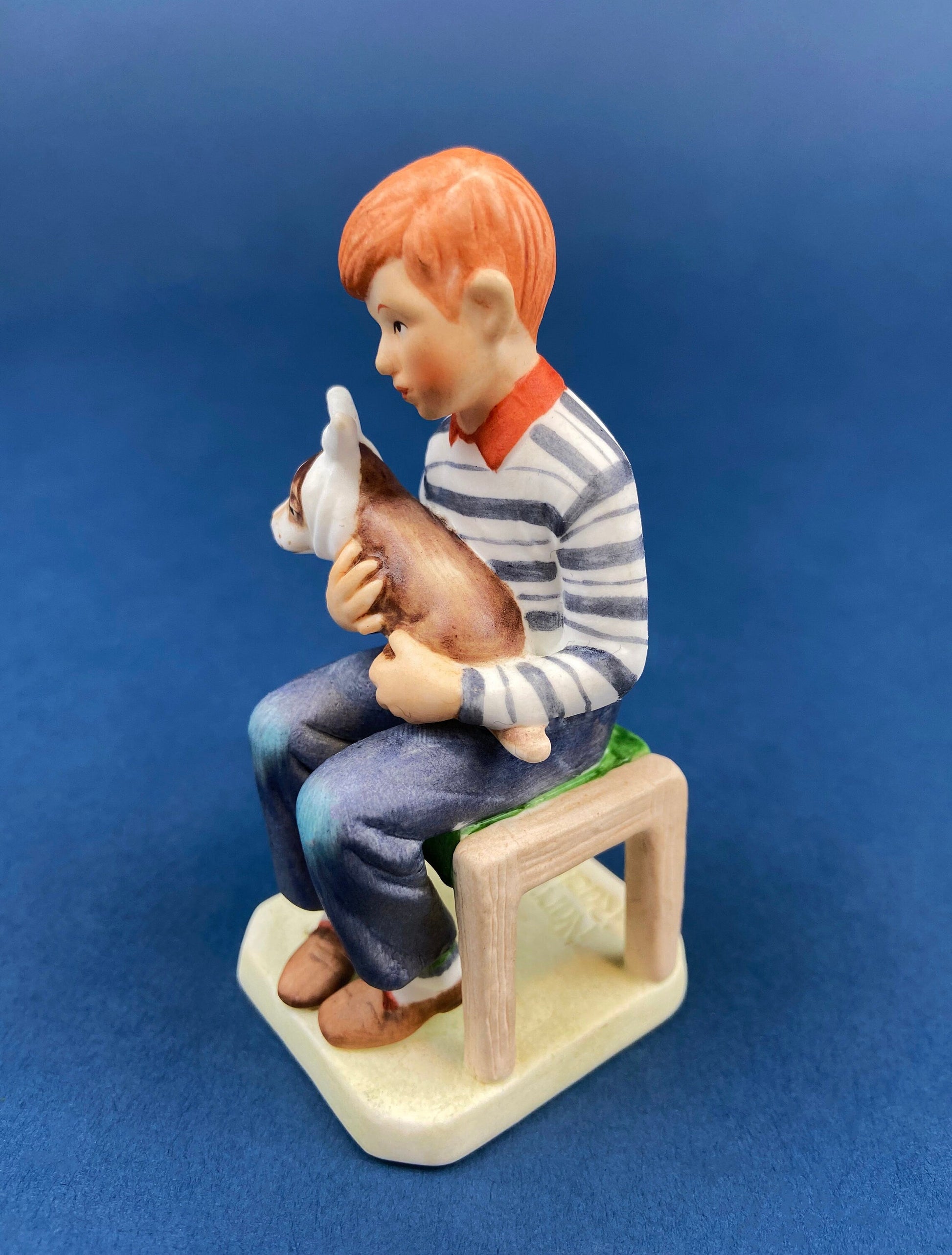 Get Well Soon Porcelain Figurine of Boy Holding Sick Dog. Inspired by Norman Rockwell's Saturday Evening Post Cover: "At the Vets." - Tampa Home & Garden Store
