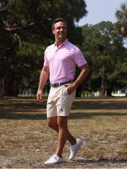 Vineyard Polo shirt pink by White Water Life on a man outdoors in a park on Tampa Home & Garden Store