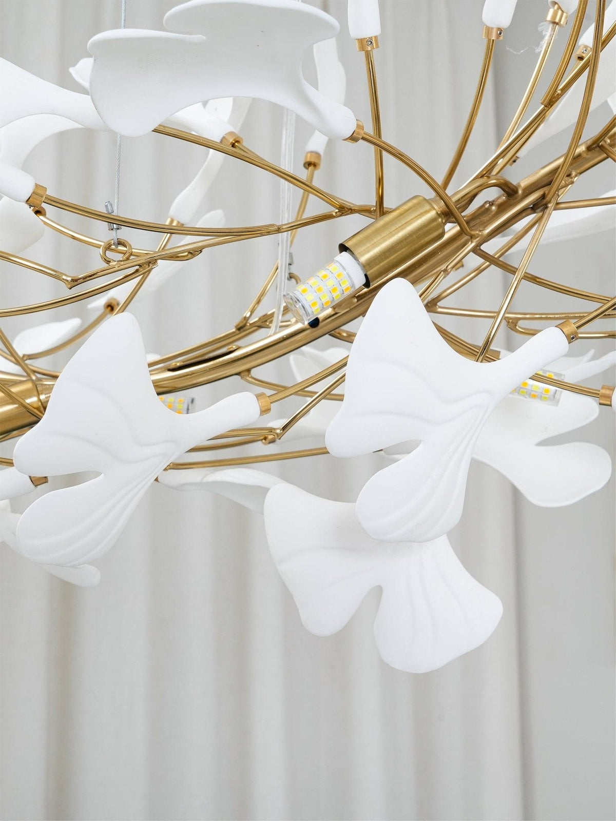 Porcelain ginkgo leaf chandelier with gold flexible branches and LED bulb modules on Tampa Home & Garden Store