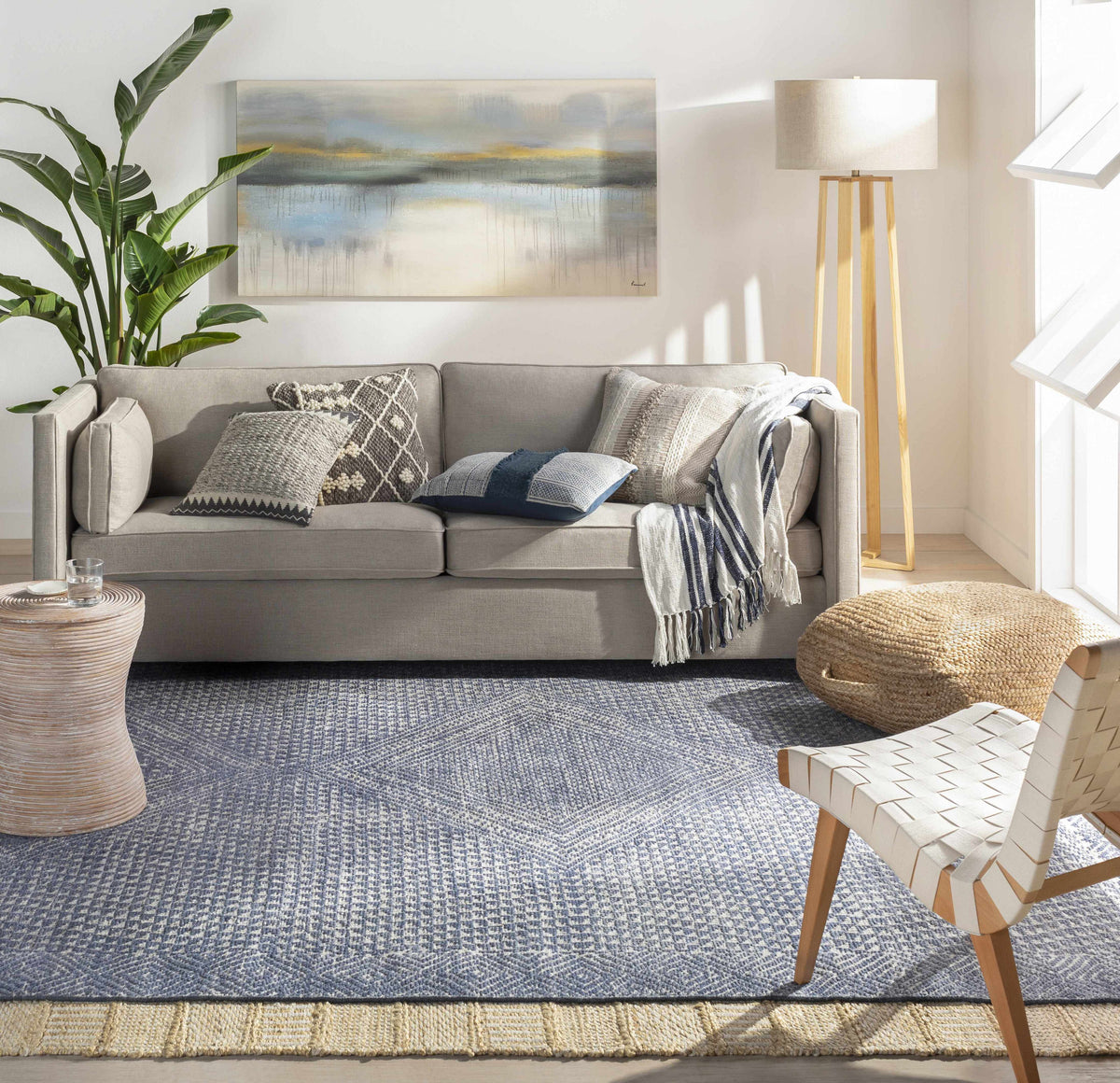 Moyne Area Rug blue gray woven pattern by Boutique Rugs in a living room setting on Tampa Home & Garden Store