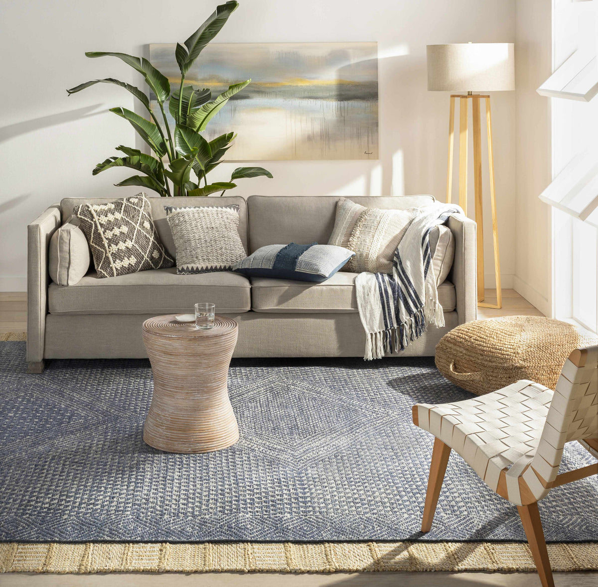 Moyne Area Rug - Clearance in blue-gray geometric pattern, Boutique Rugs, in a bright living room on Tampa Home & Garden Store