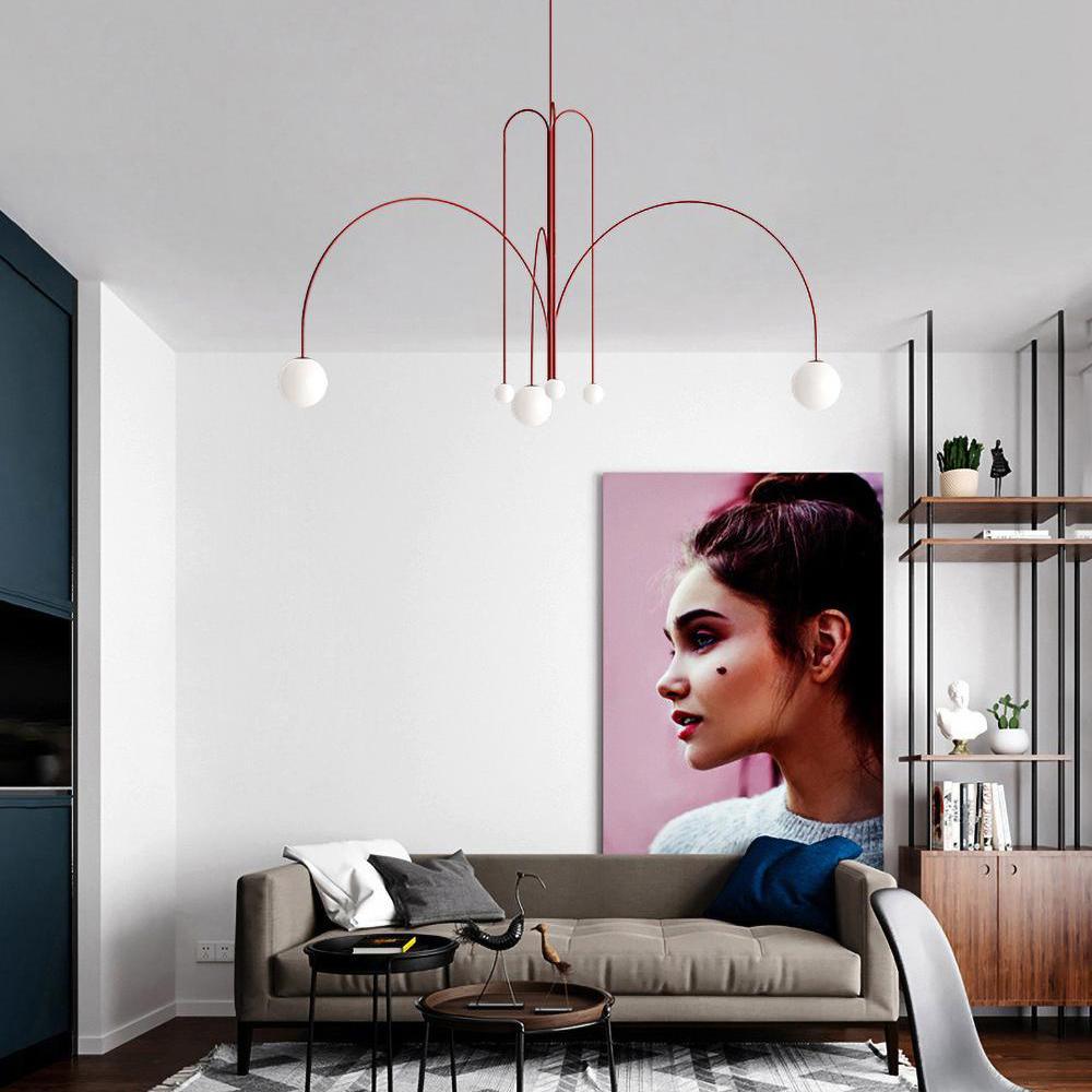 Globella 6-Head Pendant Chandelier by Moktan Sabai with arched red arms and white glass globes on Tampa Home & Garden Store