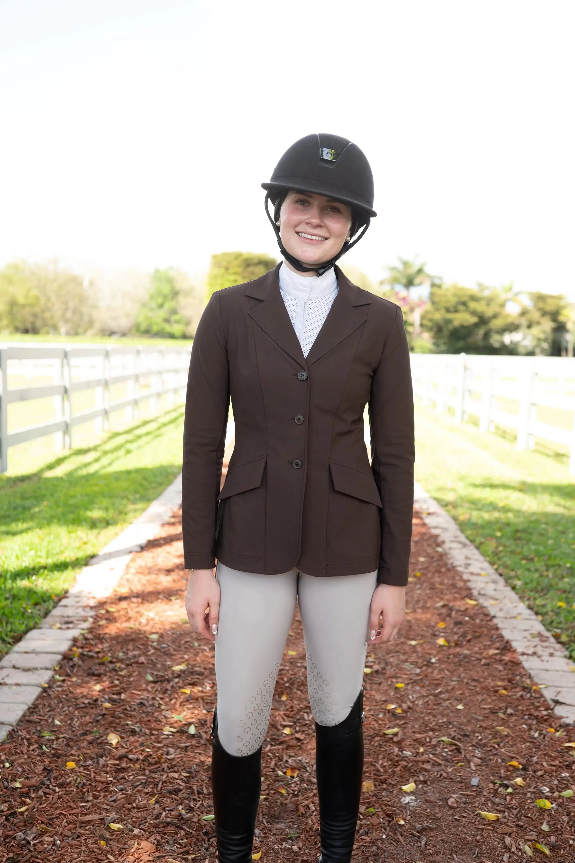 Grand Prix EQJ 3 Button Show Coat chocolate NY Tech Fabric Huntley Equestrian worn by rider on Tampa Home & Garden Store