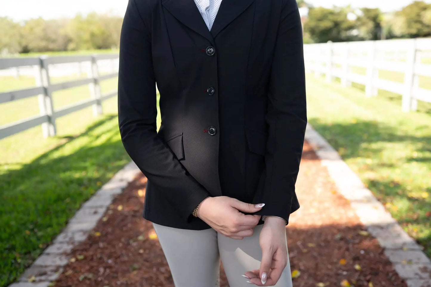 Grand Prix EQJ Ladies riding blazer in black with a 3-button front on Tampa Home & Garden Store