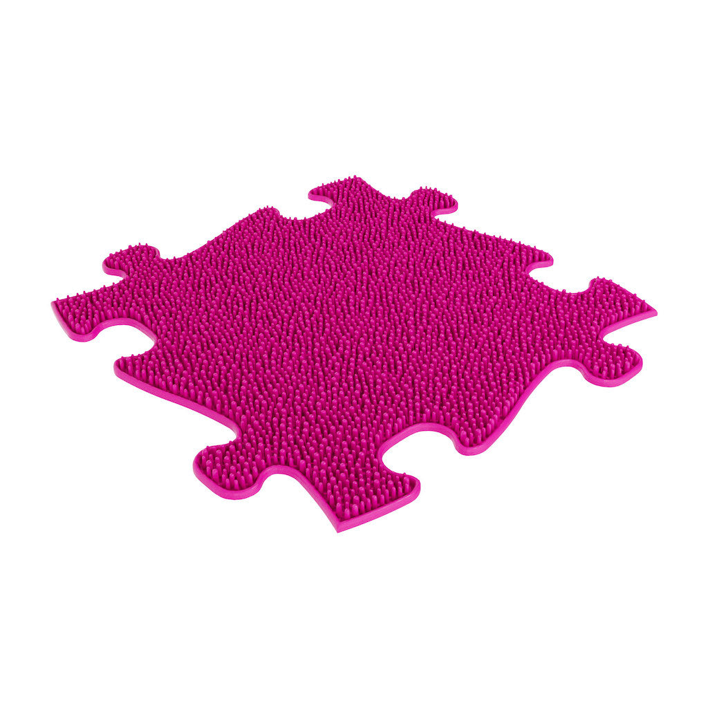 Pink sensory play mat set with puzzle-piece edges and textured nub surface on Tampa Home & Garden Store