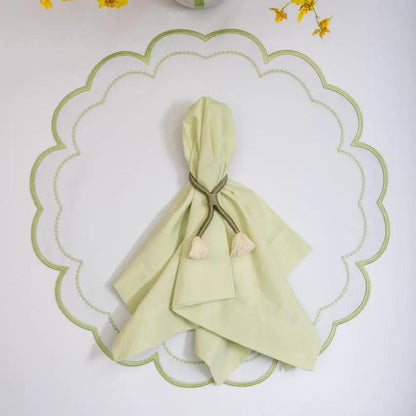 Nautical knot napkin ring with a pale green napkin and brown tassel cord for coastal tables on Tampa Home & Garden Store
