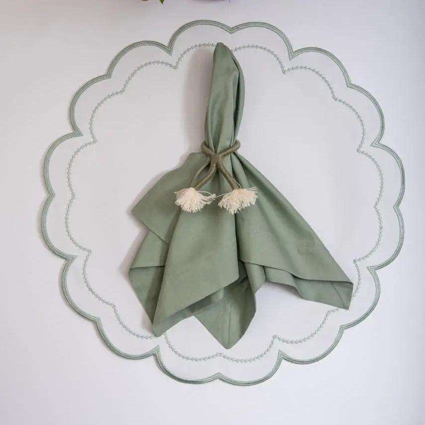 Nautical knot napkin ring holder with sage green napkin and rope tassel accent on Tampa Home & Garden Store