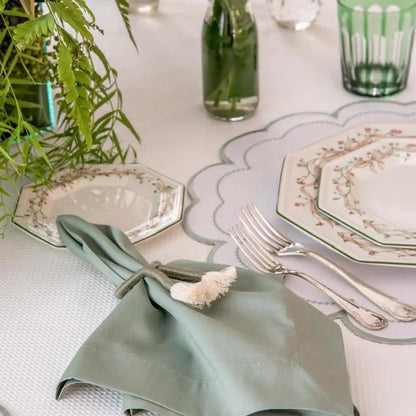 Nautical Knot Napkin Ring Holder securing a seafoam napkin on a coastal tablescape on Tampa Home & Garden Store