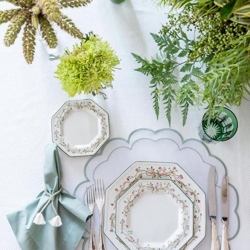 Nautical Knot Napkin Ring Holder by Talah Home on table with floral plates and teal napkin on Tampa Home & Garden Store