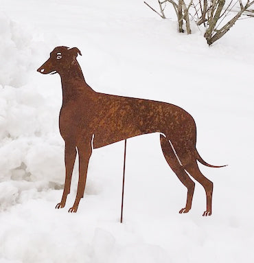 Greyhound statue rust-colored metal lawn ornament on a stake in snow on Tampa Home & Garden Store