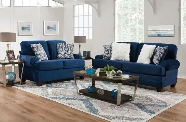 Groovy Navy 2pc Sofa & Love Seat sectional in a living room with navy upholstery and pillows on Tampa Home & Garden Store