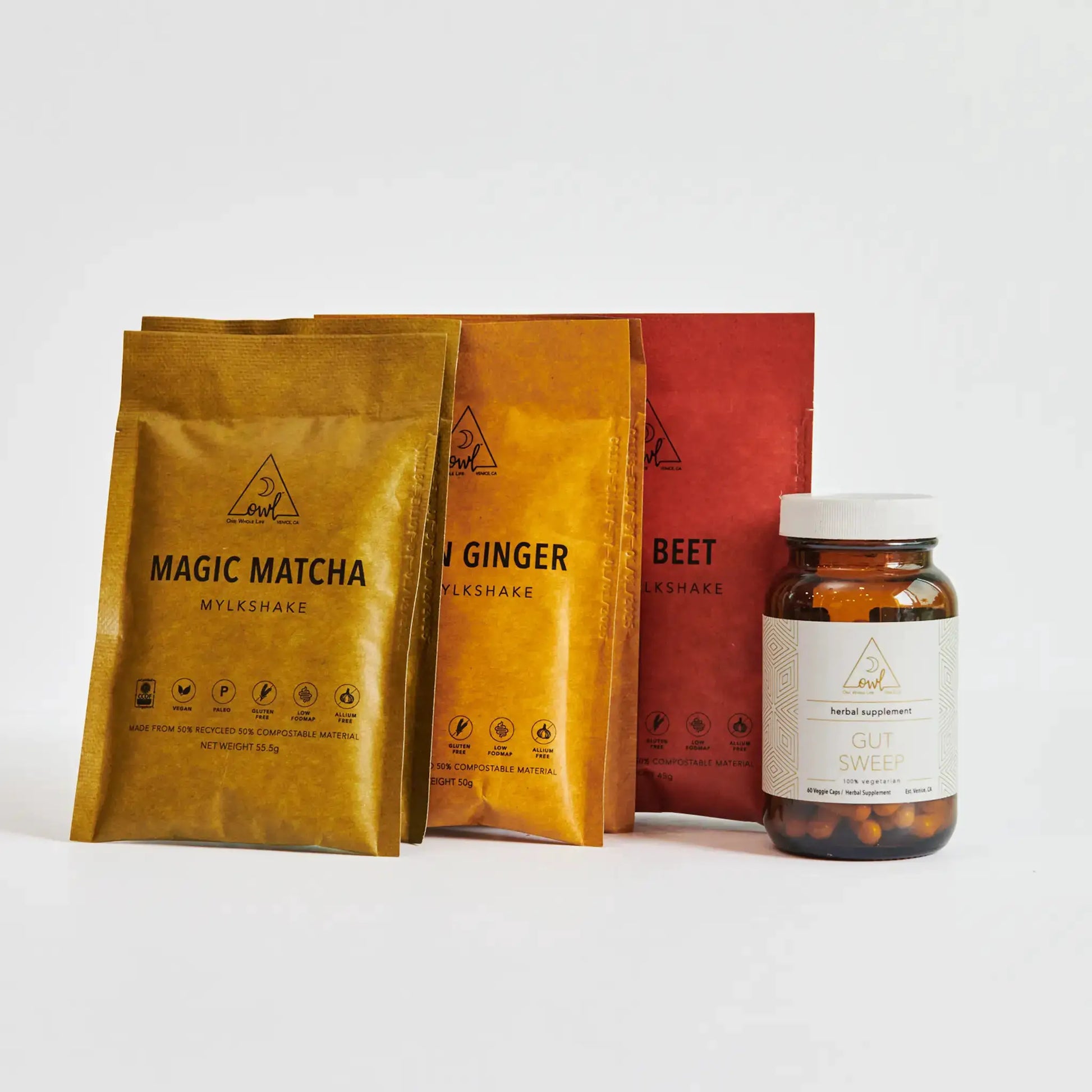 1-Week Gut Sweep Reset cleanse set: OWL Venice sachets in gold to red and herbal supplement bottle on Tampa Home & Garden Store
