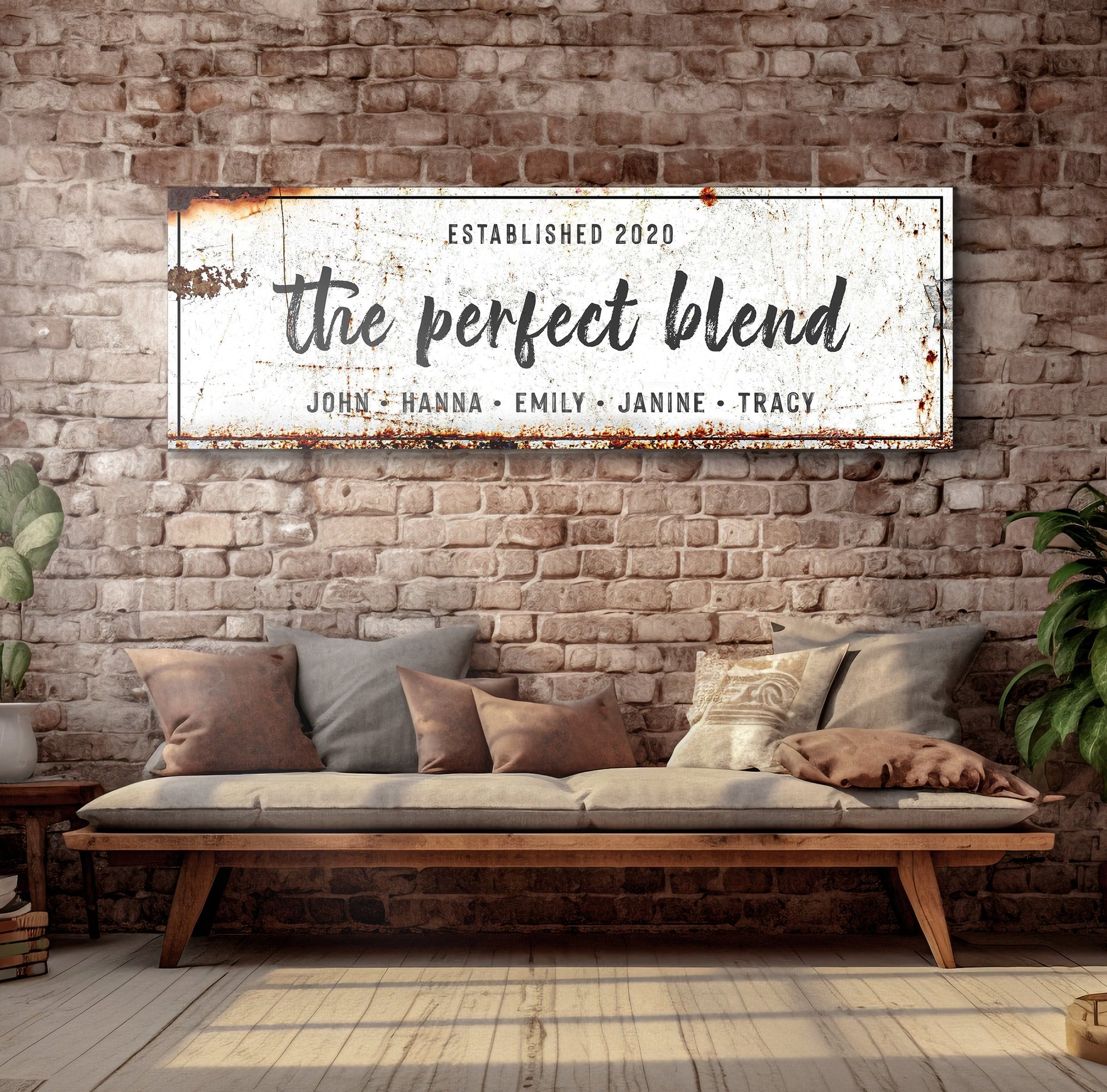 Canvas sign The Perfect Blend on a rustic distressed white panel against a brick wall on Tampa Home & Garden Store