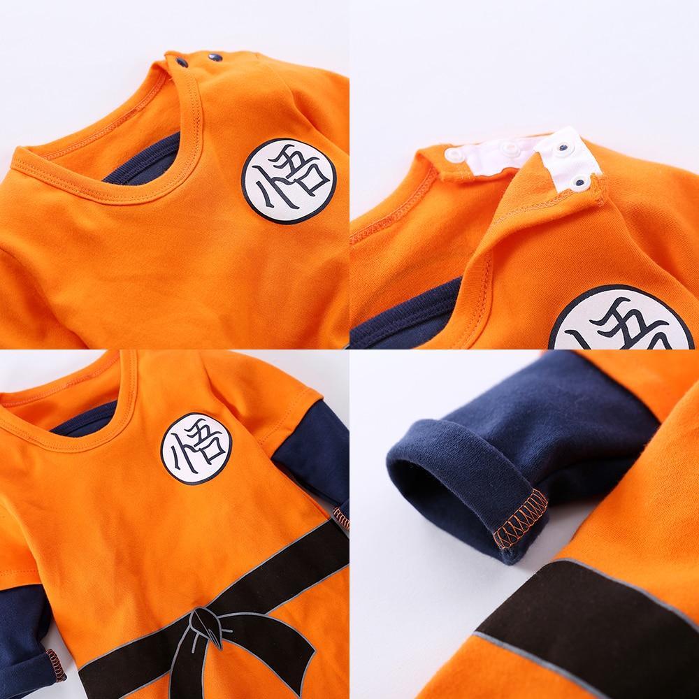 Stevvex baby romper orange with navy sleeves and dragon patch on Tampa Home & Garden Store