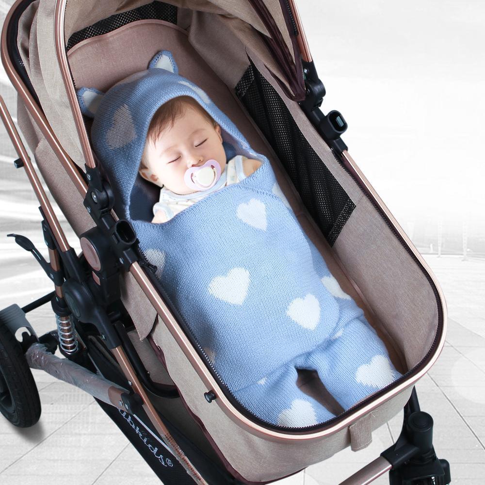 Stevvex baby sleeping bag envelope in blue knit with white hearts for newborns in stroller on Tampa Home & Garden Store