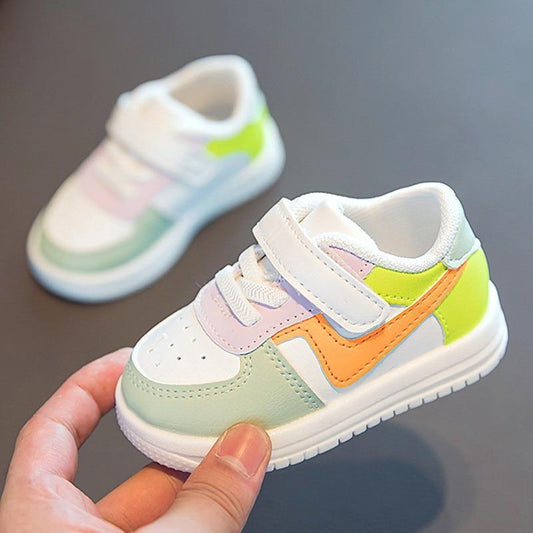 Two pastel color-block baby sneakers with Velcro straps and white sole on Tampa Home & Garden Store