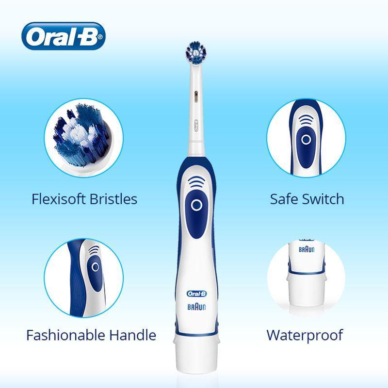 Oral-B electric toothbrush with white-blue handle and replaceable head, safe switch on Tampa Home & Garden Store