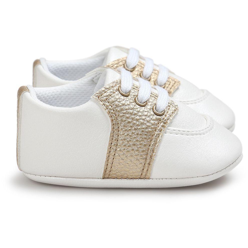 Stevvex newborn white sneakers pair with gold metallic side panel and lace-up PU leather soles on Tampa Home & Garden Store