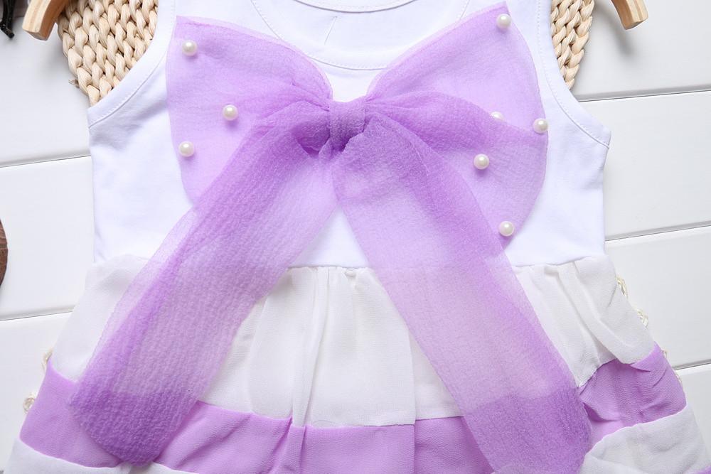 Stevvex baby girls purple chiffon dress with large bow and pearl accents on Tampa Home & Garden Store