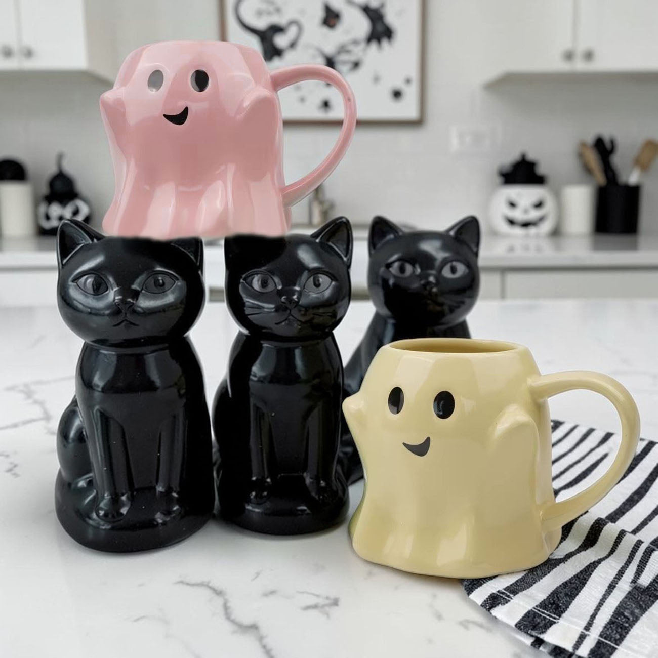 Gia Roma Ghost Mug set includes pink ghost mug, yellow ghost mug and three black cat mugs on Tampa Home & Garden Store
