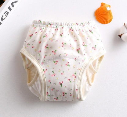 Stevvex reusable 8-layer training diaper pants, white fabric with pink cherry print, leak-proof sides on Tampa Home & Garden Store