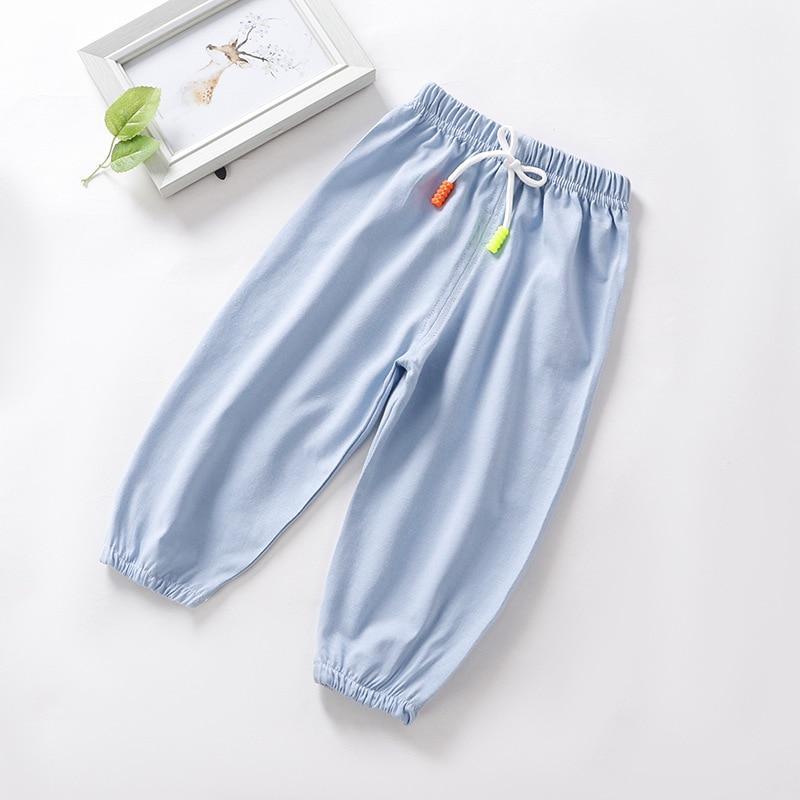 Stevvex light-blue kids pajama pants with white drawstring and color-bead accents, cuffed ankles on Tampa Home & Garden Store