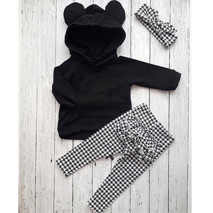 Three-piece baby girl winter outfit: hooded black pullover, houndstooth pants and headband on Tampa Home & Garden Store