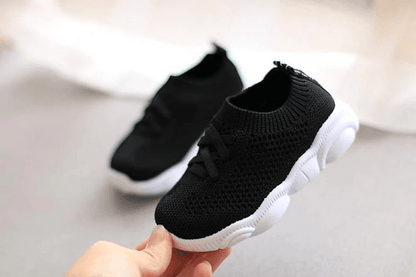 Baby sneakers black knit upper with white anti-slip sole for toddlers on Tampa Home & Garden Store