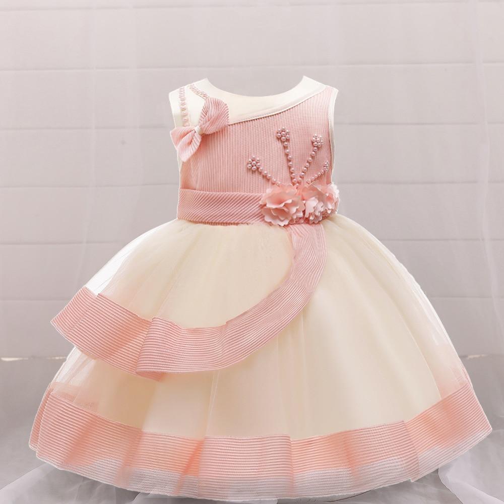 Baby girl net pink puffy princess party dress with bead accents, bow, and layered tulle skirt on Tampa Home & Garden Store