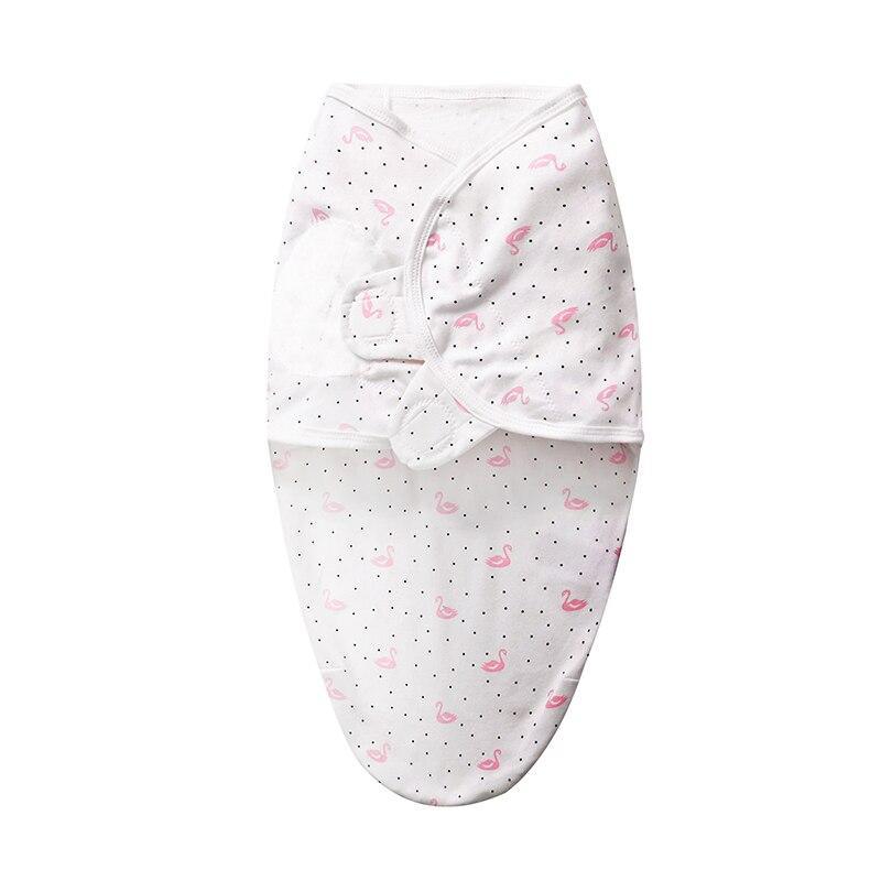 Baby swaddle sleepsack by Stevvex, white with pink flamingo pattern and tiny black dots on Tampa Home & Garden Store