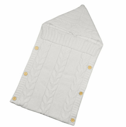 Stevvex knitted white baby swaddle blanket with cable knit pattern and wooden buttons on Tampa Home & Garden Store