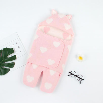 Baby sleeping bag Stevvex: pink knitted swaddle with white hearts and hood for newborns on Tampa Home & Garden Store