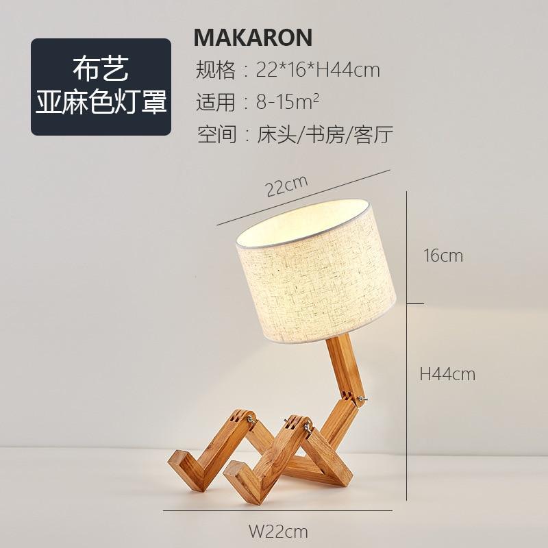 Stevvex wood robot-shaped folding table lamp with beige linen shade on Tampa Home & Garden Store