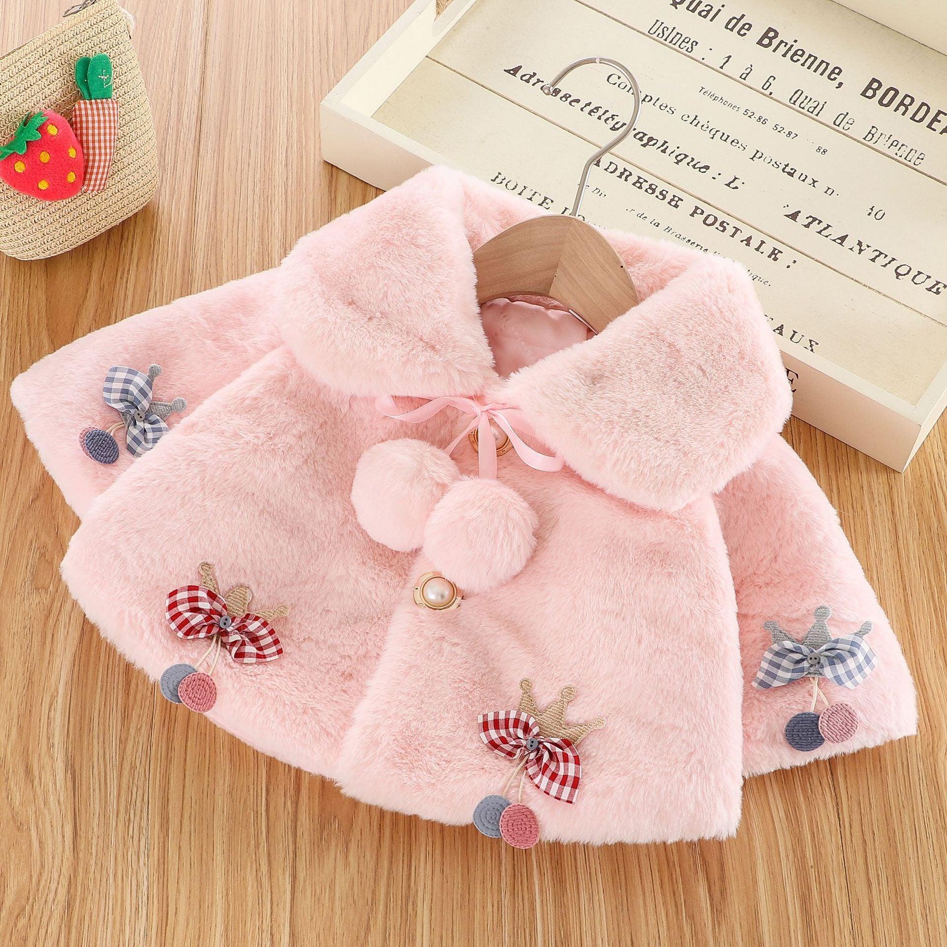 Pink plush baby fur cloak with hood and ears, adorned with pink ribbons and gingham bows on Tampa Home & Garden Store