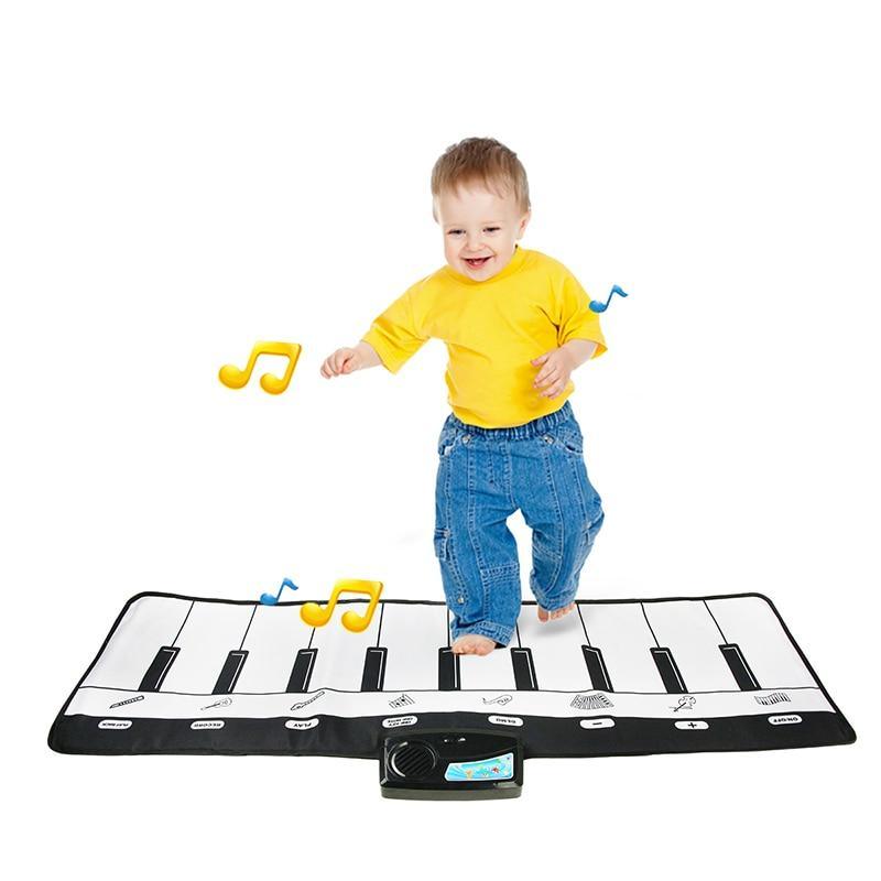 Stevvex piano mat for kids, large keyboard carpet with black-and-white keys, kid playing on Tampa Home & Garden Store