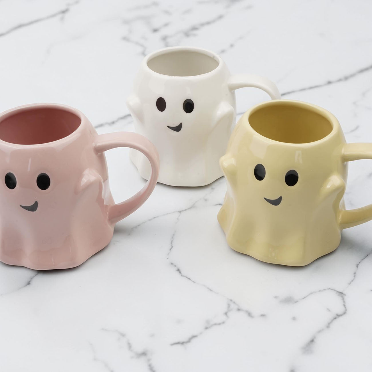 Ghost mugs by Gia Roma, set of 3 pastel ceramic mugs in pink white yellow with friendly faces on Tampa Home & Garden Store