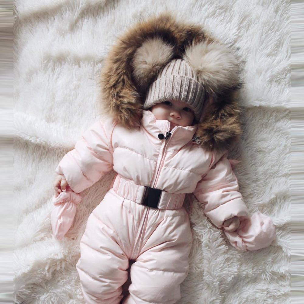 Stevvex infant winter snowsuit in pale pink with fur-trimmed hood and belt on Tampa Home & Garden Store