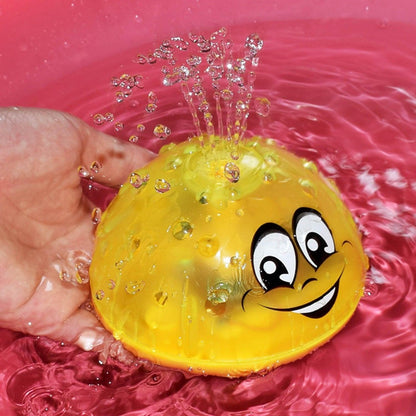 Bath toy ball Stevvex yellow with rotating water jets, LED lights, and music for kids on Tampa Home & Garden Store
