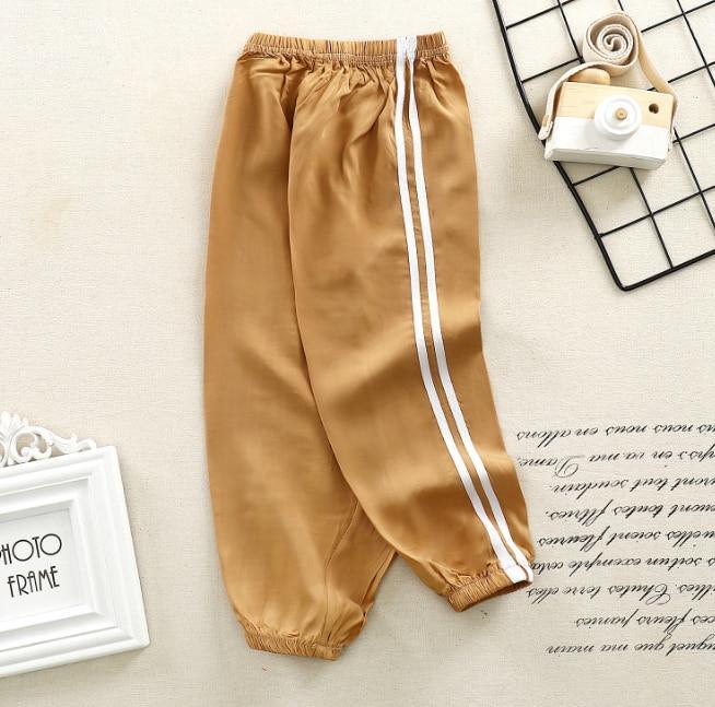 Stevvex kids sports pants tan with white side stripes, elastic waist & cuffs on Tampa Home & Garden Store