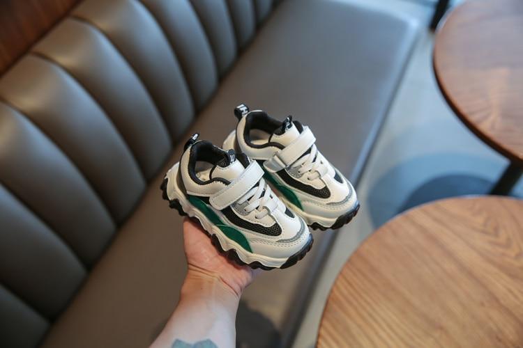 Stevvex baby sneakers, white mesh canvas with black and green accents, Velcro straps pair on Tampa Home & Garden Store