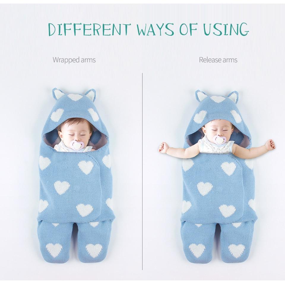 Stevvex blue knitted baby sleeping bag envelope style with white heart pattern, two usage states on Tampa Home & Garden Store