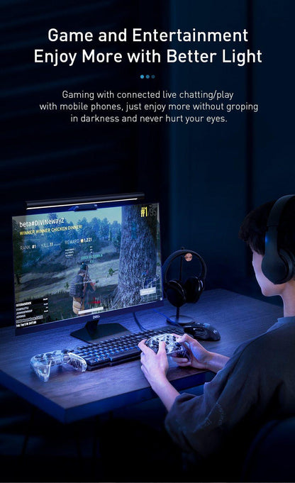 Stevvex Screenbar LED desk lamp on a black LCD monitor in a dark gaming setup with keyboard on Tampa Home & Garden Store